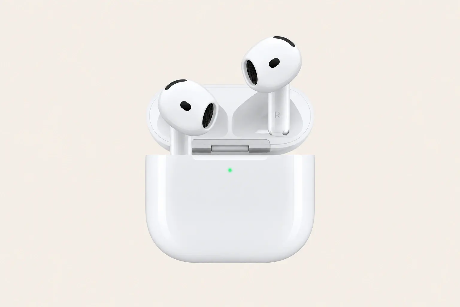 White AirPods 5 above their open charging case, shown against a cream background.